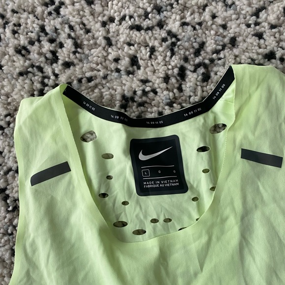 *NIKE* neon yellow running singlet. Used for competing track and filed events. - Picture 3 of 4